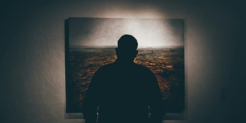 A person breaking free from their harsh inner critic and self-doubt.