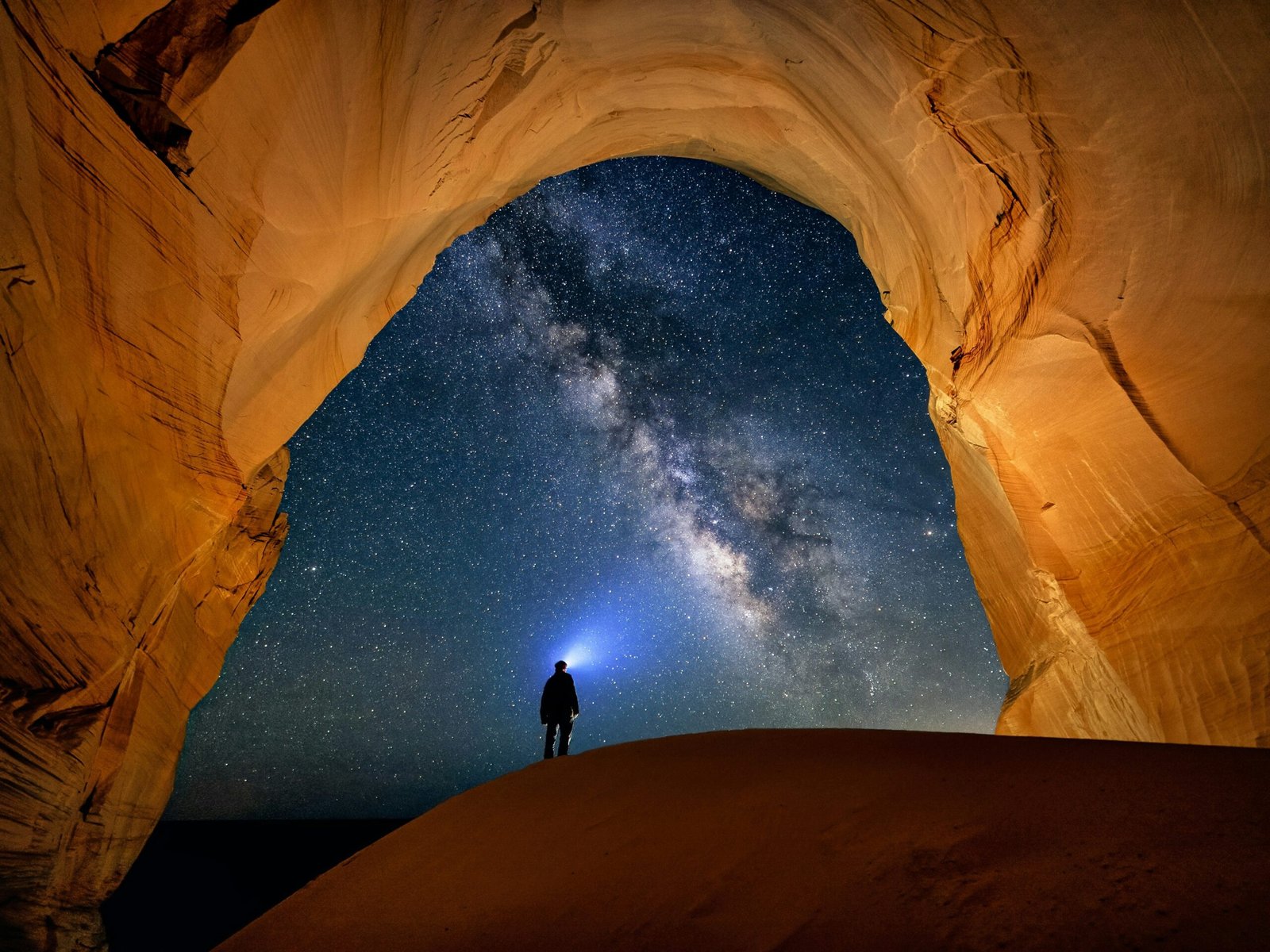 person contemplating the cosmos and universe understanding itself
